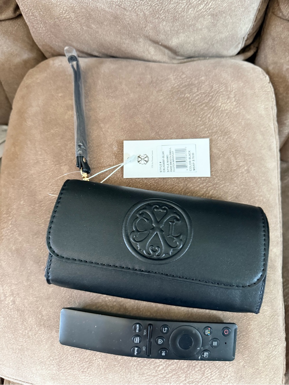 Black Wristlet Clutch with Embossed Medallion